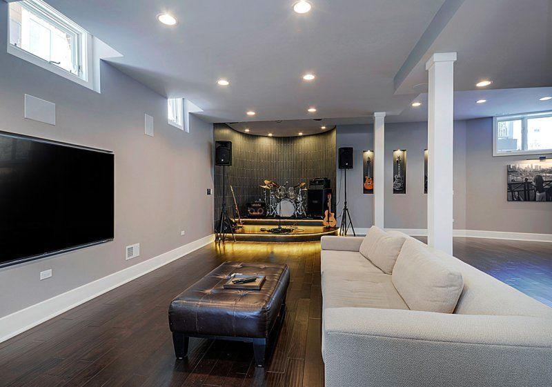 Basement Apartment with Sofa and TV